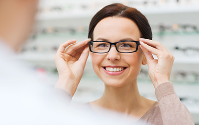 Woman Trying On Glasses